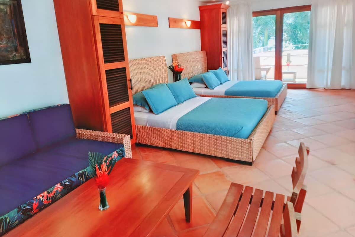 Familie studio | Luxe beddengoed, een kluis op de kamer, individueel gedecoreerd