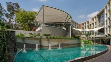 Outdoor pool, open 7:00 AM to 7:00 PM, pool umbrellas, sun loungers