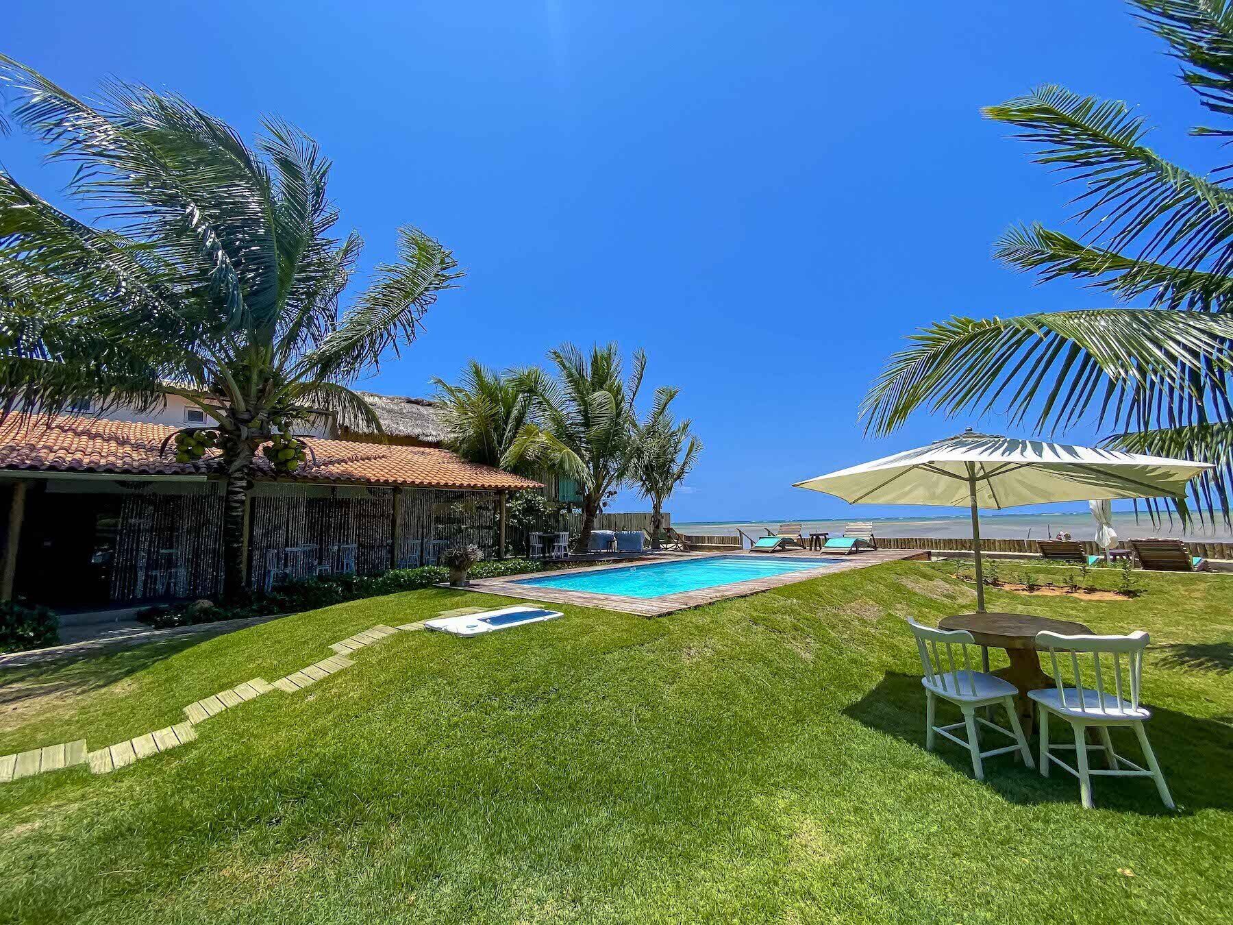 outdoor pool, pool umbrellas, pool loungers