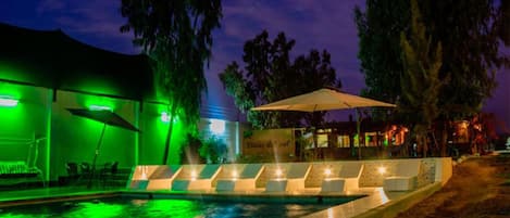 Outdoor pool, open 10:00 AM to 8:00 PM, pool loungers