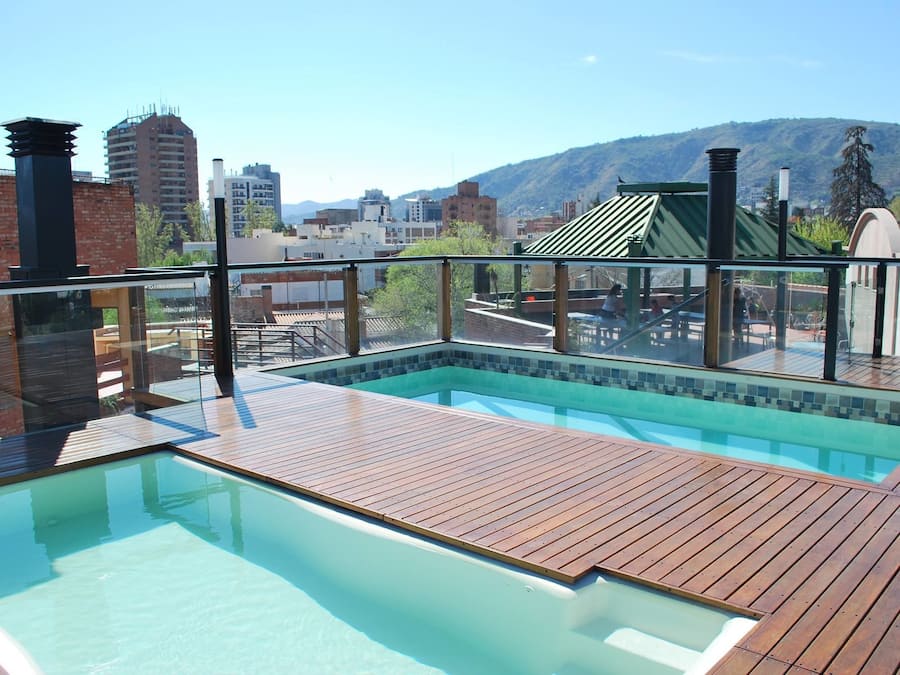 2 outdoor pools, a rooftop pool
