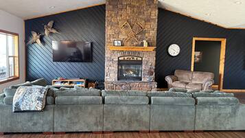 Smart TV, fireplace, foosball