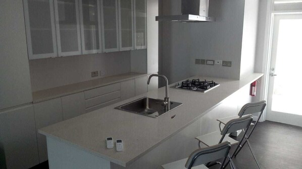 Apartment, 2 Bedrooms | Private kitchen | Full-size fridge, microwave, oven, dishwasher
