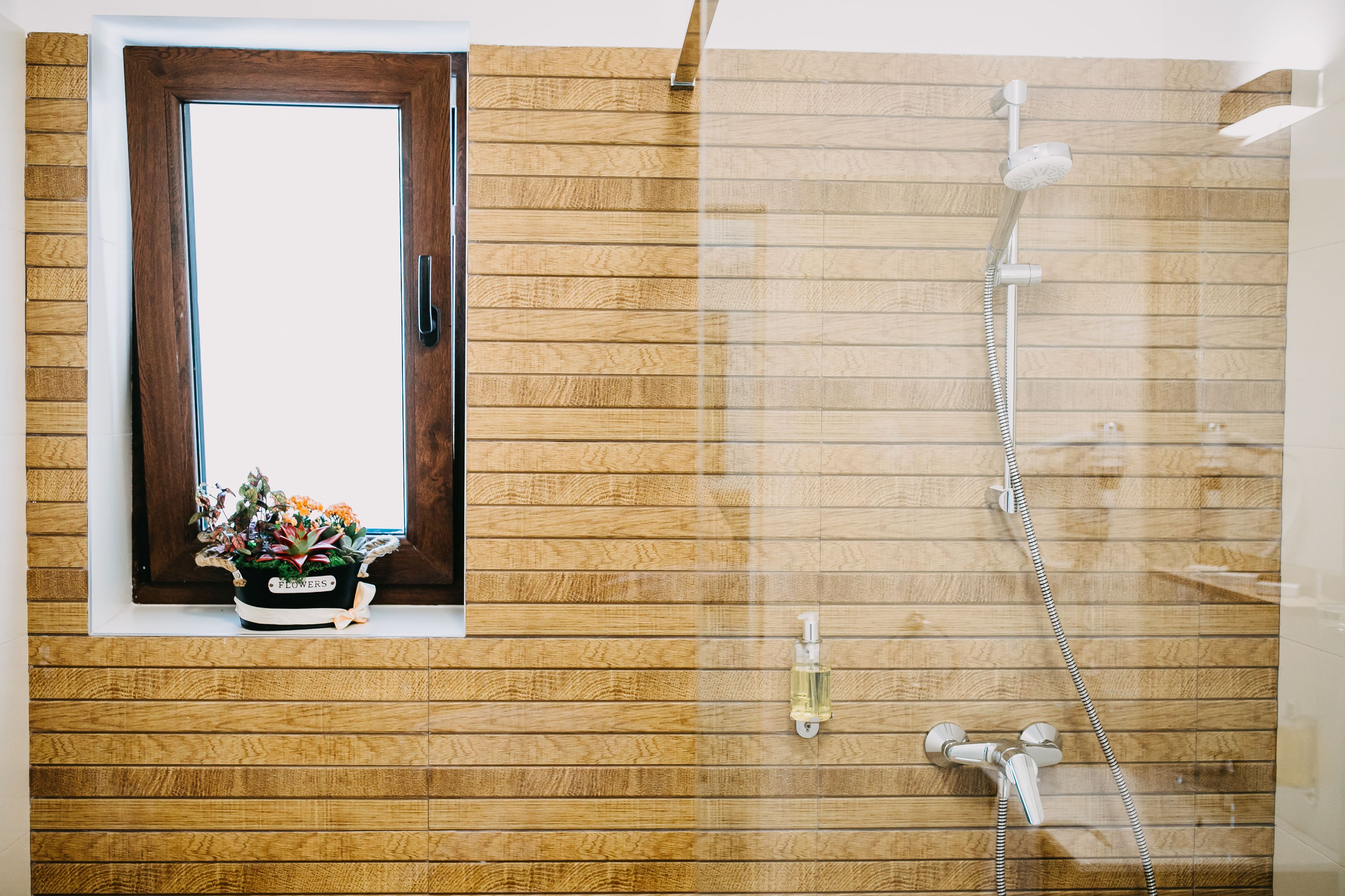 Deluxe Apartment, 1 Queen Bed, Terrace, City View | Bathroom | Shower, rainfall showerhead, free toiletries, hair dryer