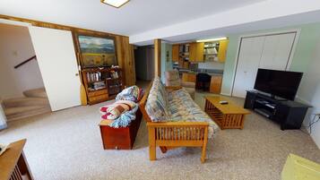 Cabin (2 Bedroom 1 Bath Cabin - sleeps up to) | Living room | Flat-screen TV, DVD player