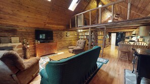 Cabin (Authentic Western Log Cabin with Full) | Living room | Flat-screen TV, fireplace, DVD player