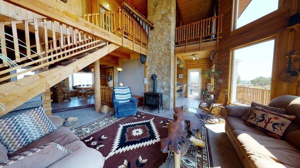 Cabin (Majestic Family Cabin w/stunning view) | Living room | Flat-screen TV, fireplace