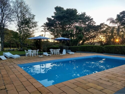 Very green place to relax by the pool