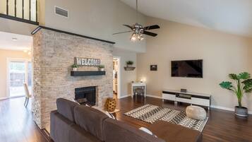 Smart TV, fireplace, books