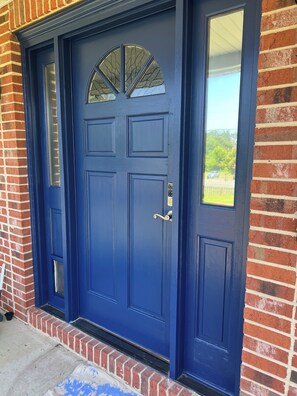 A blue front door with a glass panel and a small window on the right side. - Smallwood St Park, Groups, Fire Pit, Blackstone, large parking area (Marbury)