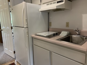Fridge, microwave, stovetop, coffee/tea maker