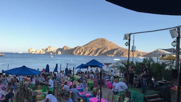 On the beach, sun loungers, beach towels