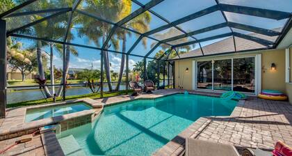 Breezy Palm, Family Friendly Home On The Water-Heated Elec Pool-Spa, WIFI