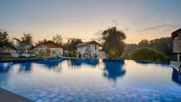 2 outdoor pools, open 7:00 AM to 8:00 PM, free cabanas, pool umbrellas