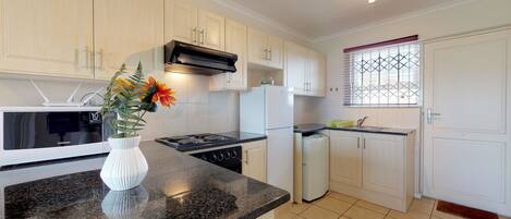 Classic Apartment, 2 Bedrooms | Private kitchen | Fridge, microwave, oven, stovetop