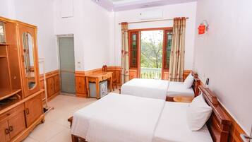 Habitación básica con 1 cama doble o 2 individuales | Ropa de cama de alta calidad y colchones con acolchado adicional