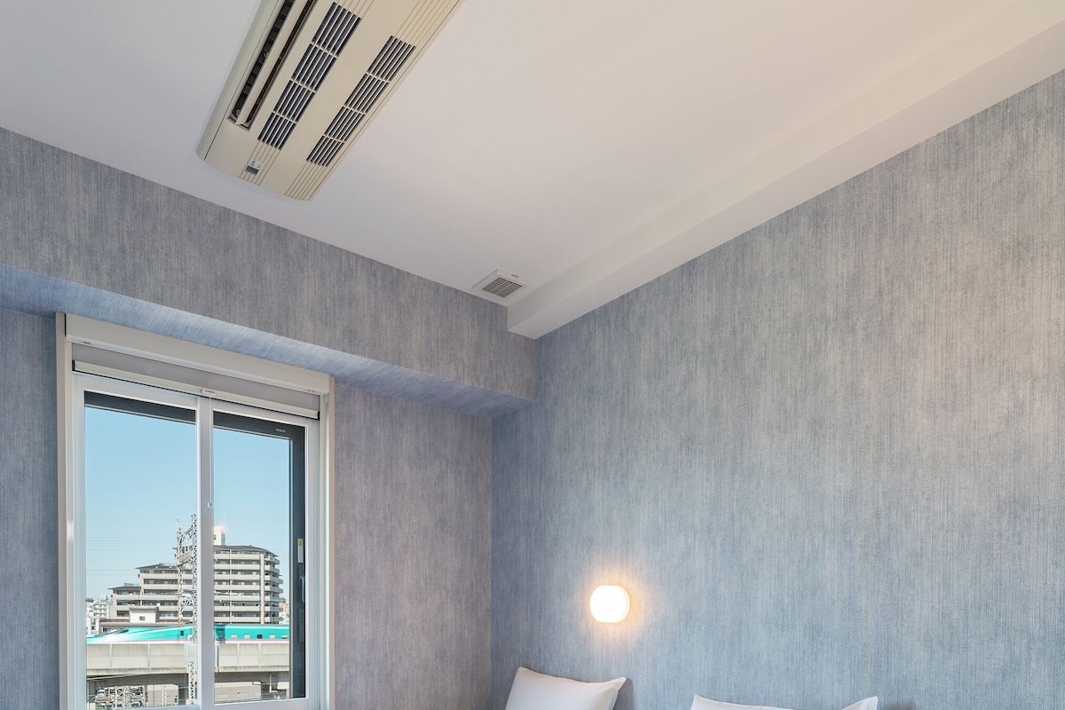 Twin Room | Down comforters, in-room safe, desk, free WiFi