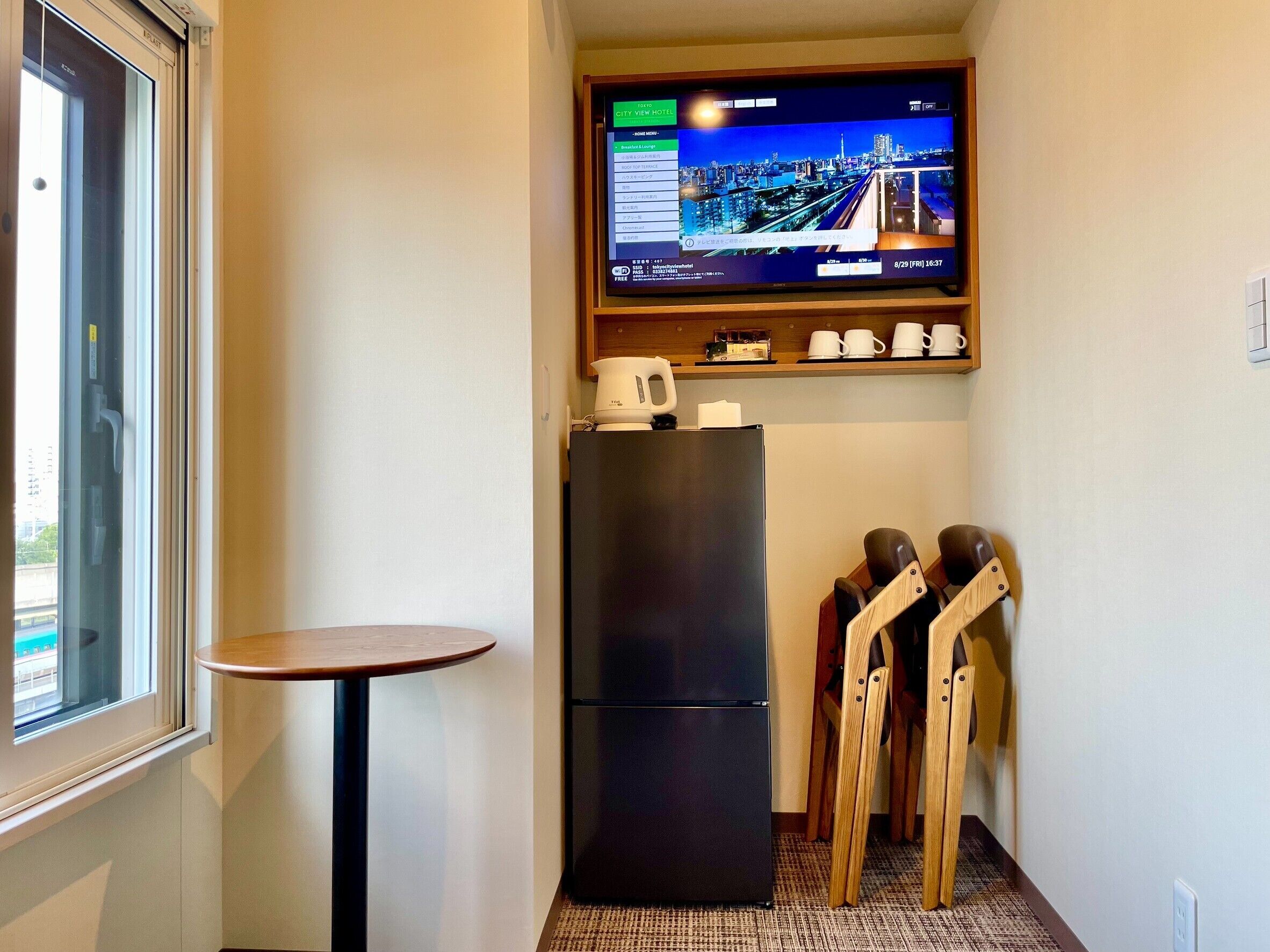 family triple room, city view | down duvets, in-room safe, desk, free wifi