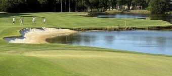 1st Floor! Corner Unit! 3 Bedrooms! True Blue Golf Course, Minutes from Beach!