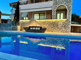 Outdoor pool, pool umbrellas, pool loungers