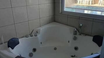 Economy Double Room, 1 Queen Bed | Bathroom | Shower, free toiletries, hair dryer, towels