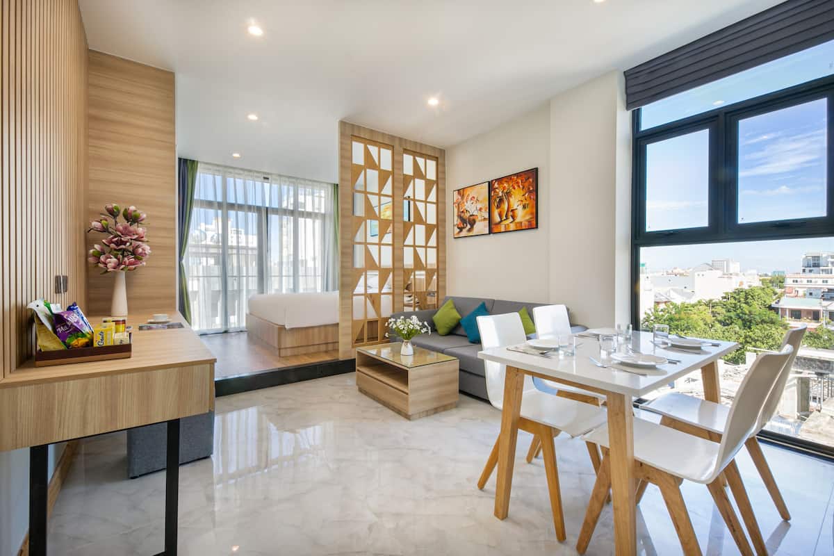 Family Studio, Balcony | Living area | Flat-screen TV