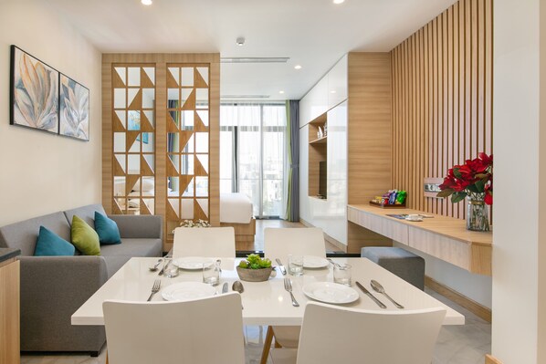 Family Studio, Balcony | Living area | Flat-screen TV - Sun River Hotel & Apartment (Da Nang)