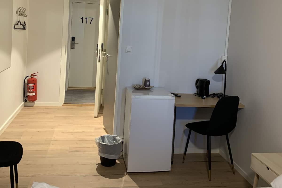 Pillow-top beds, desk, laptop workspace, blackout curtains