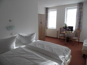 Desk, rollaway beds, bed sheets