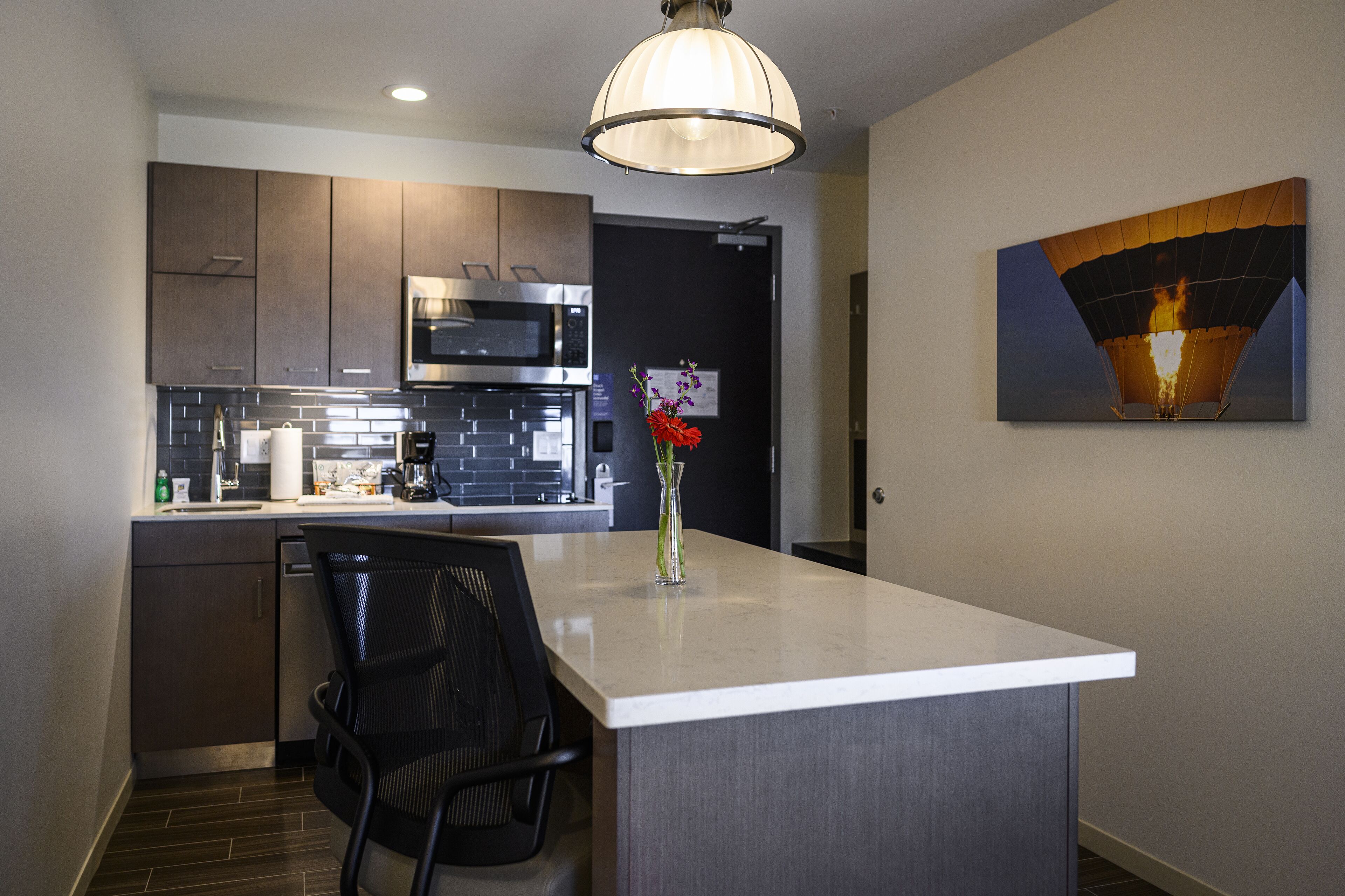 fridge, microwave, coffee/tea maker, high chair