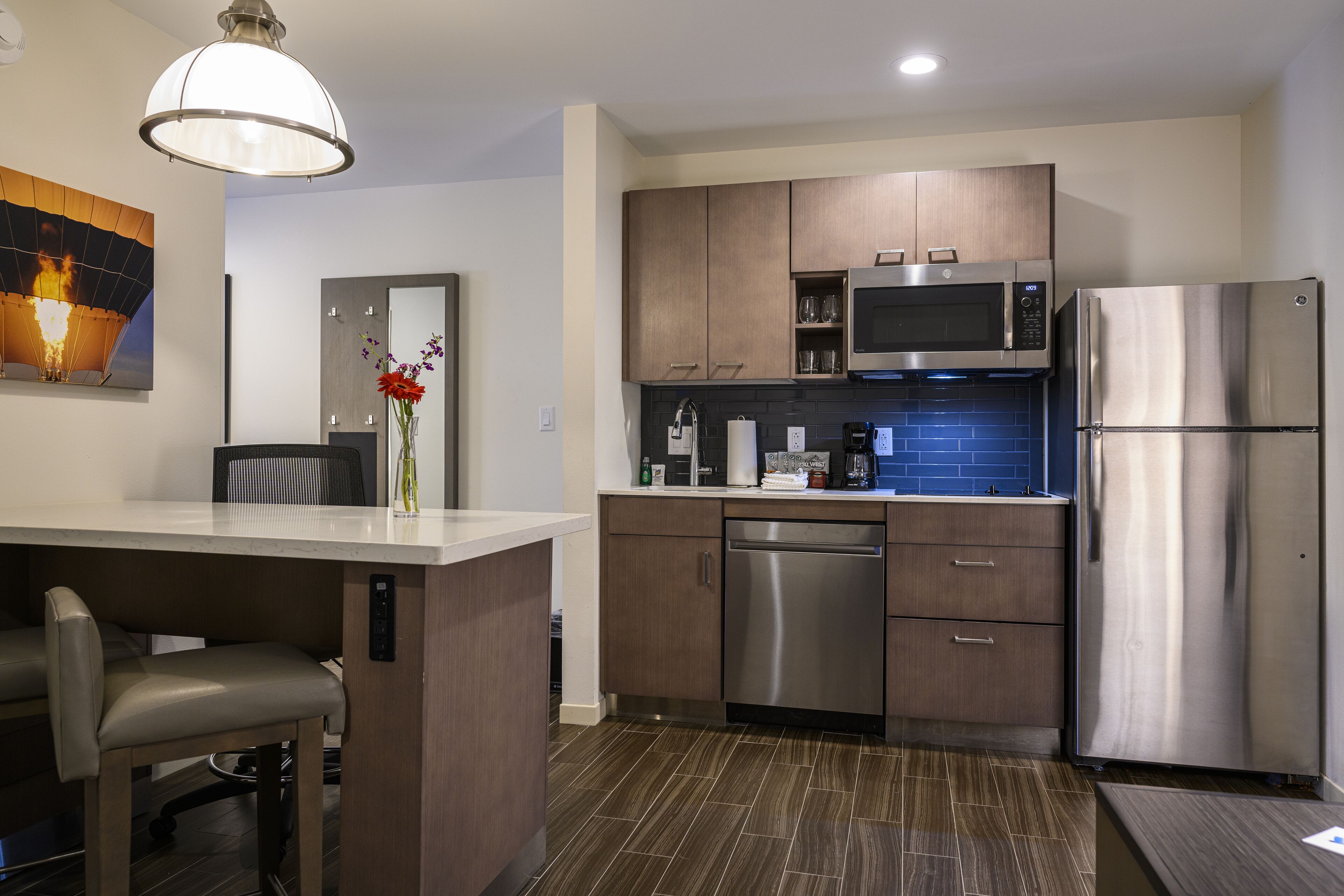 fridge, microwave, coffee/tea maker, high chair