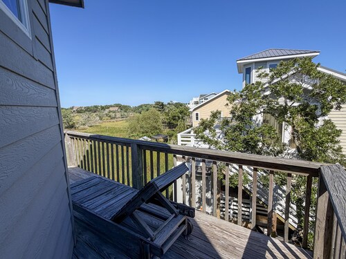 Xenia House:  Enjoy decks and screened porch overlooking the marsh.