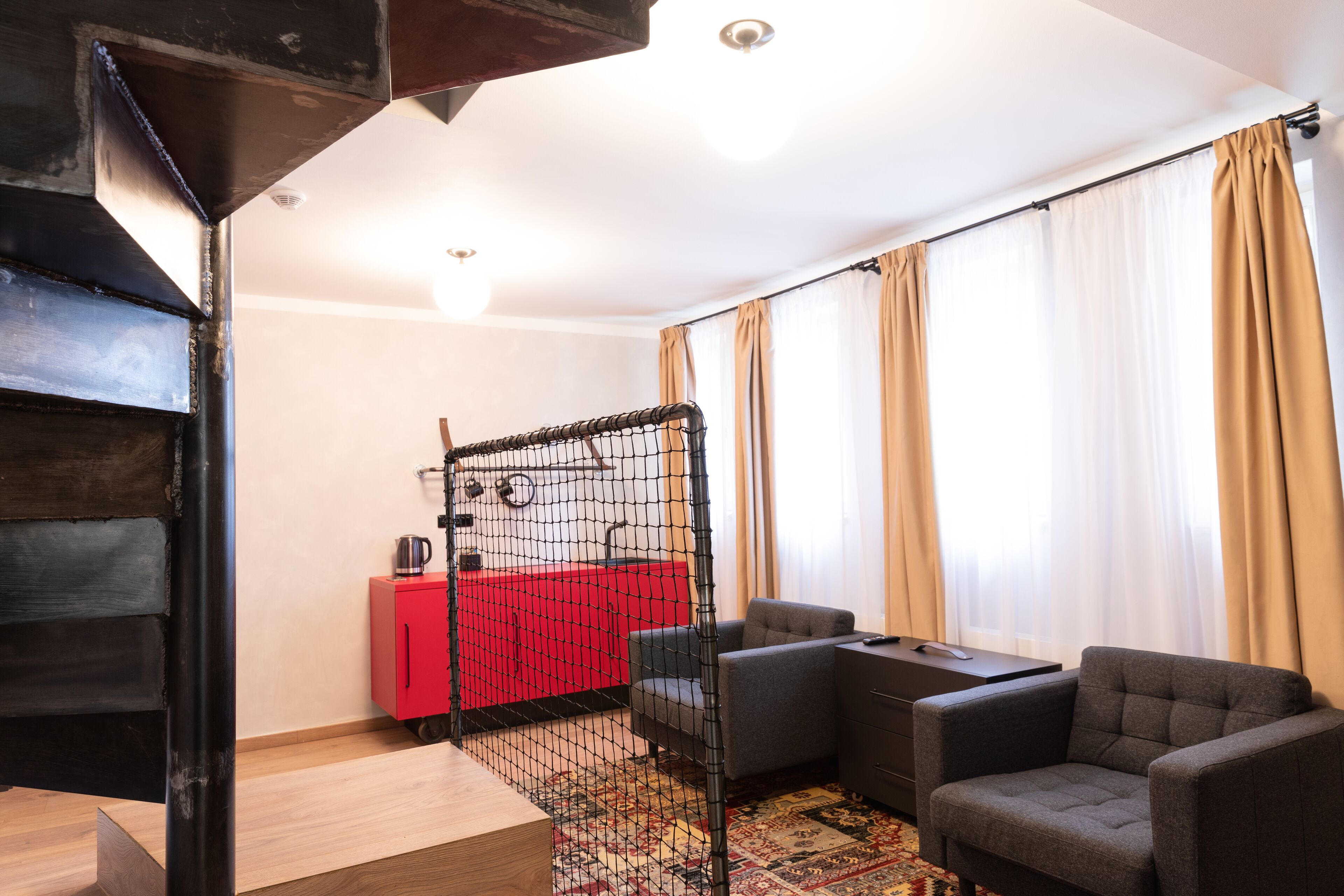 panoramic loft suite with terrace - accessible by stairs only | living area | 42-inch flat-screen tv with cable channels, tv