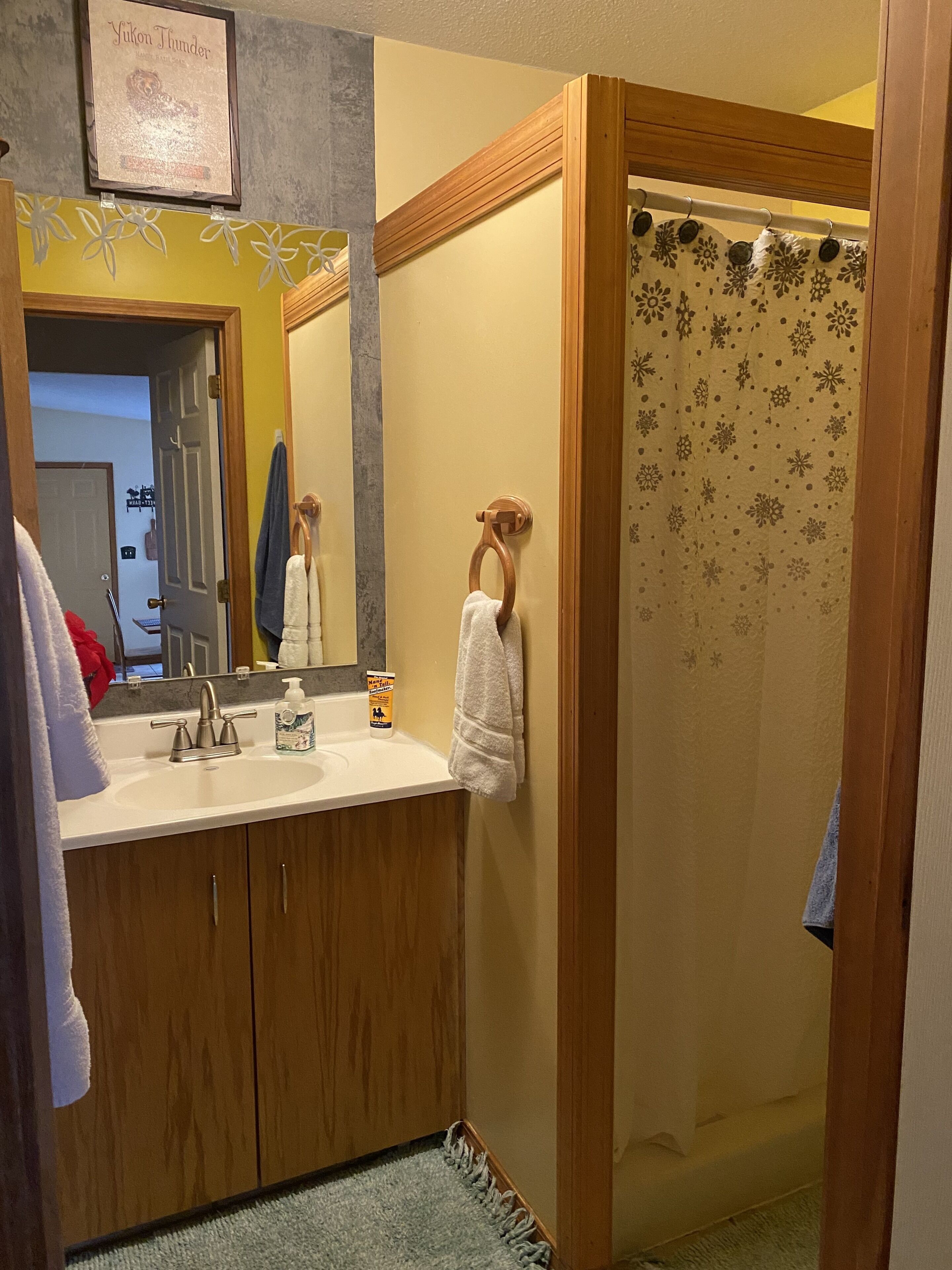 Combined shower/tub, hair dryer, towels, soap