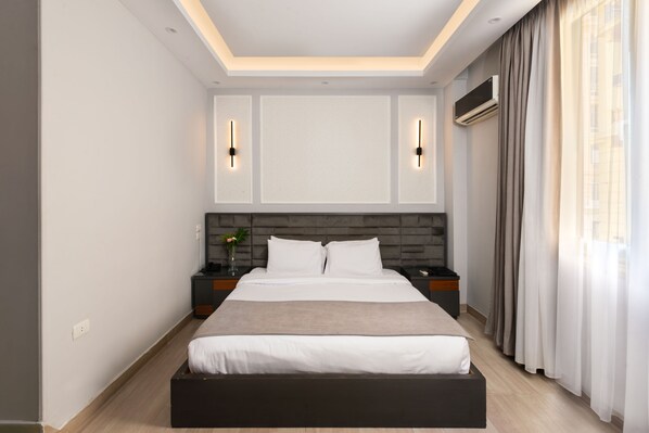Chambre double | Minibar, rideaux d’obscurcissement, système d’insonorisation