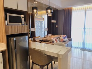 Family Apartment, 1 Bedroom, Kitchen | Living area | 43-inch LCD TV with digital channels, TV