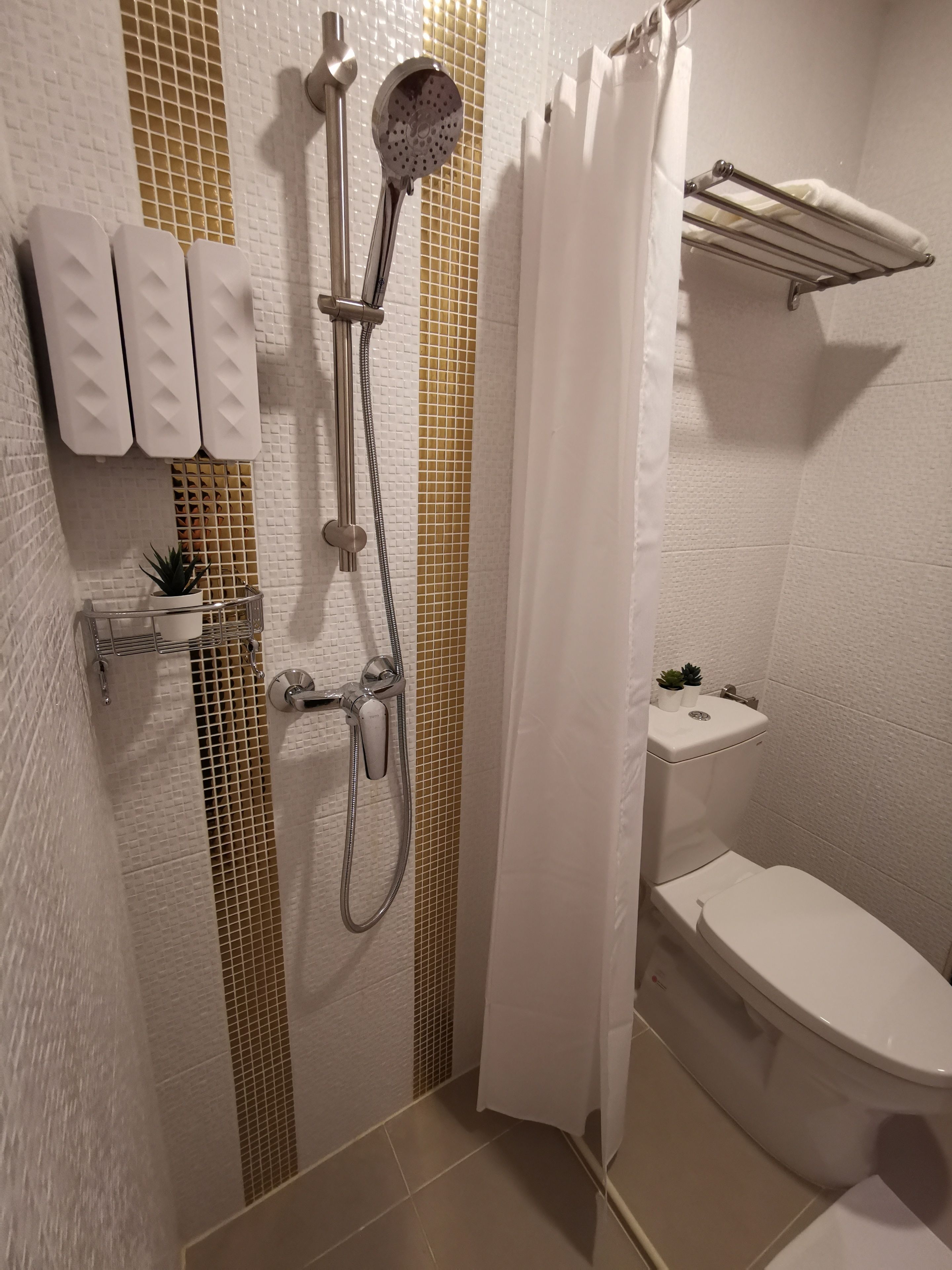 shower, hair dryer, bathrobes, slippers