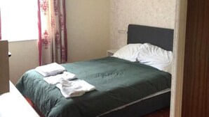 Iron/ironing board (on request), bed sheets - The Chatsworth Hotel (Great Yarmouth)