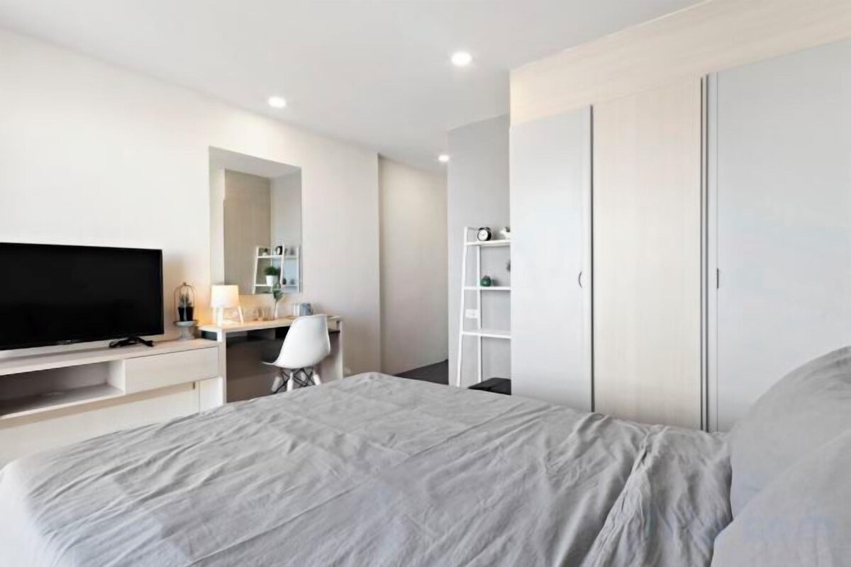 Desk, laptop workspace, blackout curtains, free WiFi