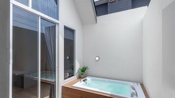 Villa | Bathroom | Separate bathtub and shower, jetted bath, rainfall showerhead