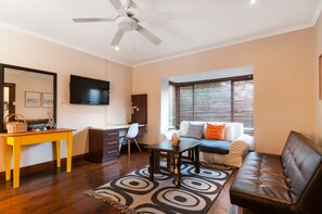 Upstairs Apartment | Living room | TV, fireplace, heated floors, offices