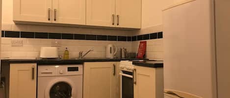 Apartment | Private kitchen | Fridge, microwave, oven, stovetop