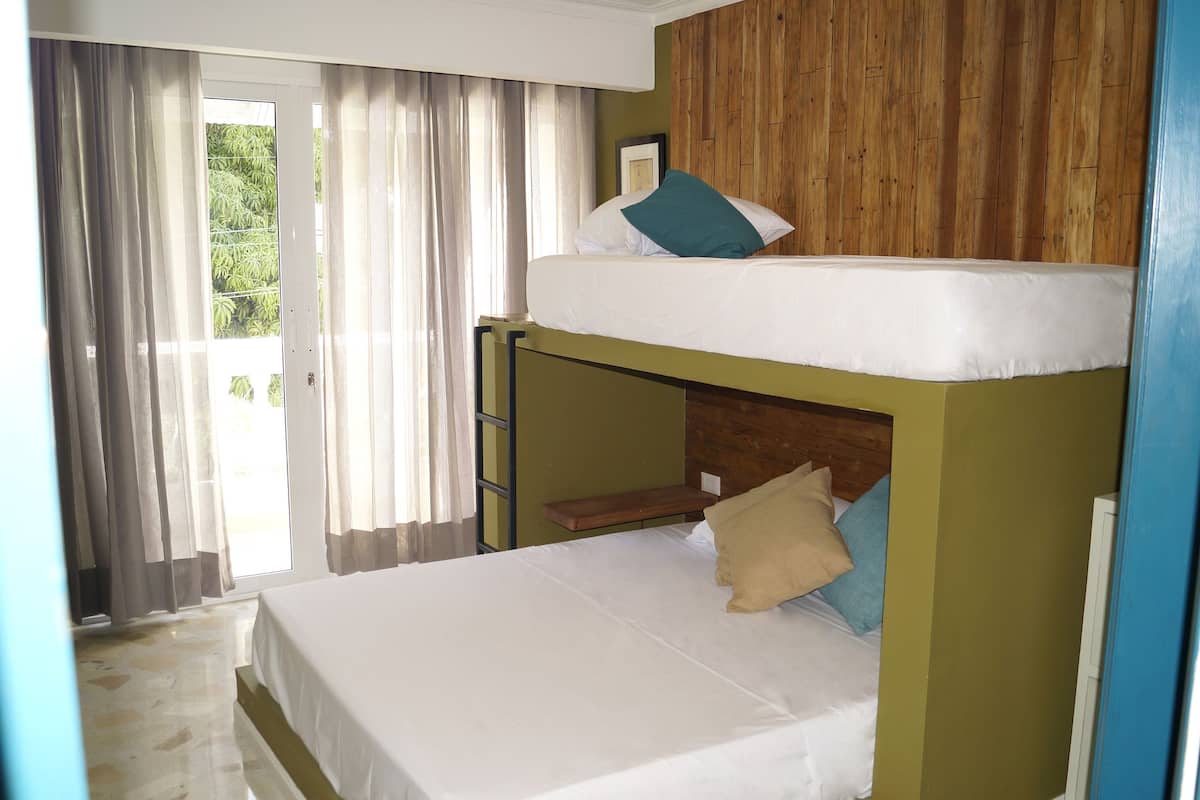 Standard Quadruple Room, Multiple Beds, Private Bathroom | Free WiFi, bed sheets