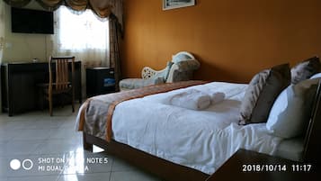 Luxe tweepersoonskamer | Een minibar, een kluis op de kamer, individueel gedecoreerd