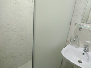 Apartment | Bathroom | Shower, towels, soap, toilet paper