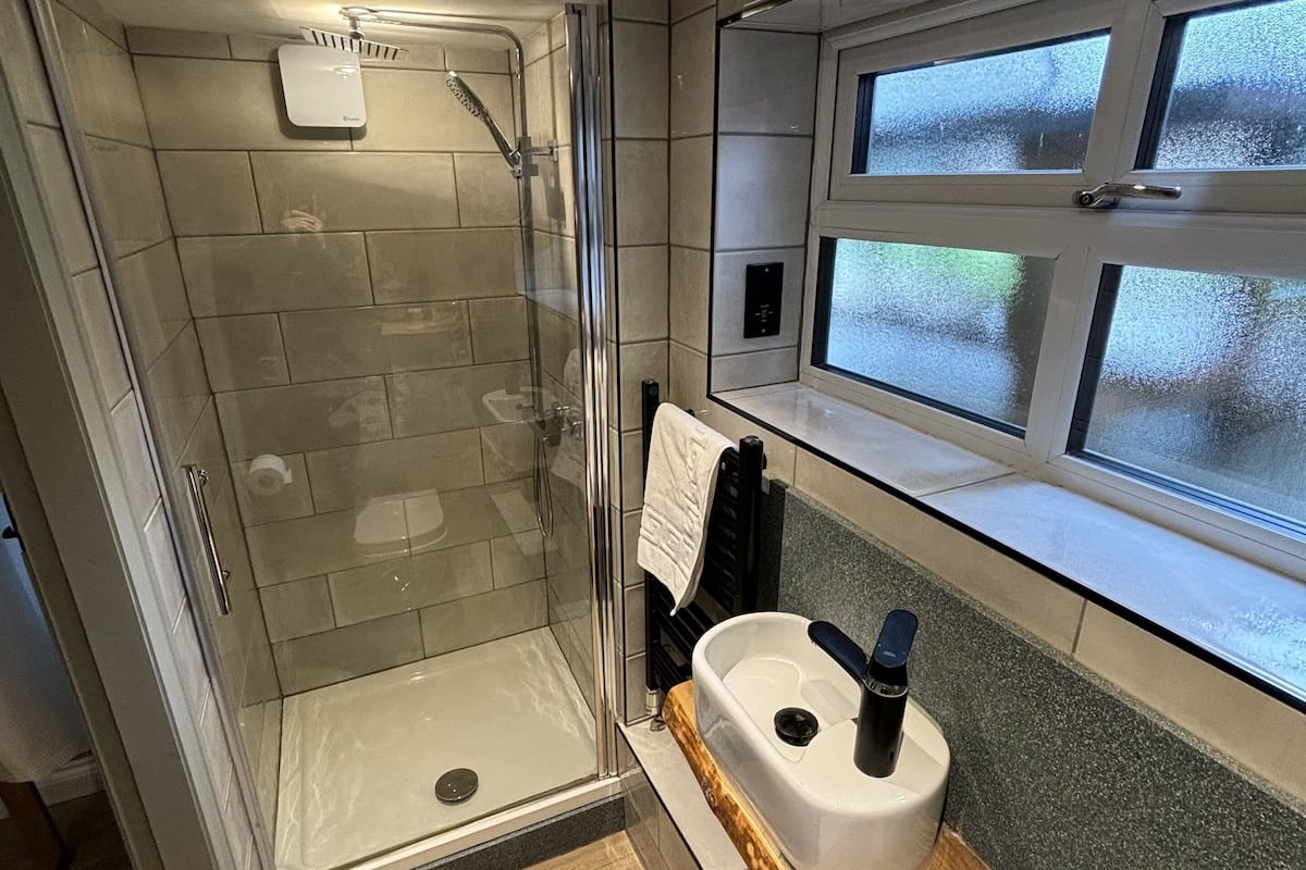 deluxe king | bathroom | free toiletries, hair dryer, bathrobes, towels
