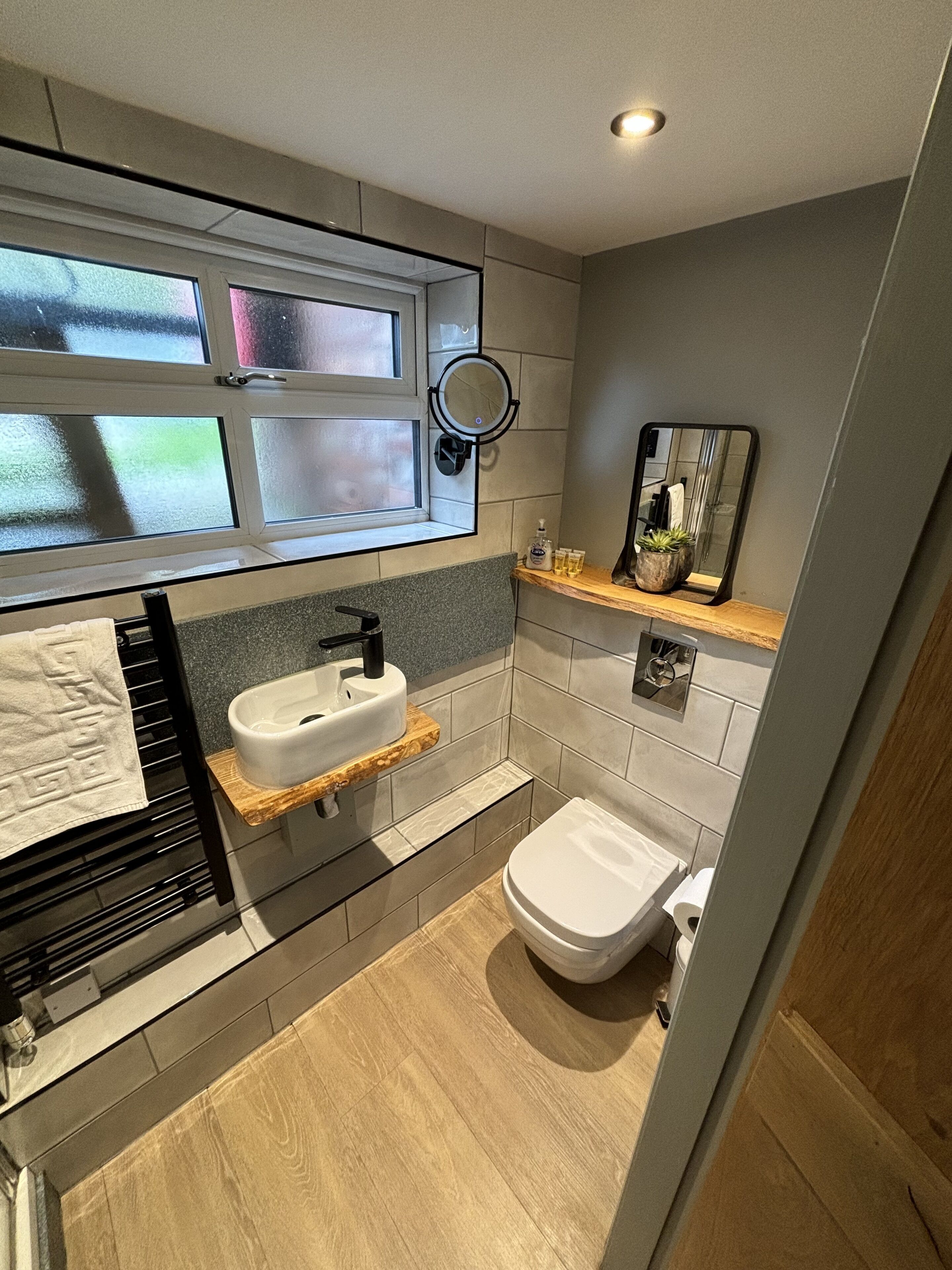 deluxe king | bathroom | free toiletries, hair dryer, bathrobes, towels