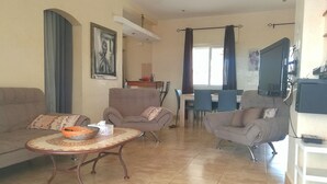 Family Villa, 3 Bedrooms, Pool View, Poolside | Living room | Flat-screen TV - Villa Elodie (La Somone)