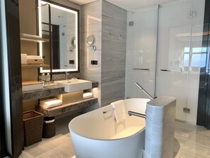 Separate bathtub and shower, rainfall showerhead, designer toiletries