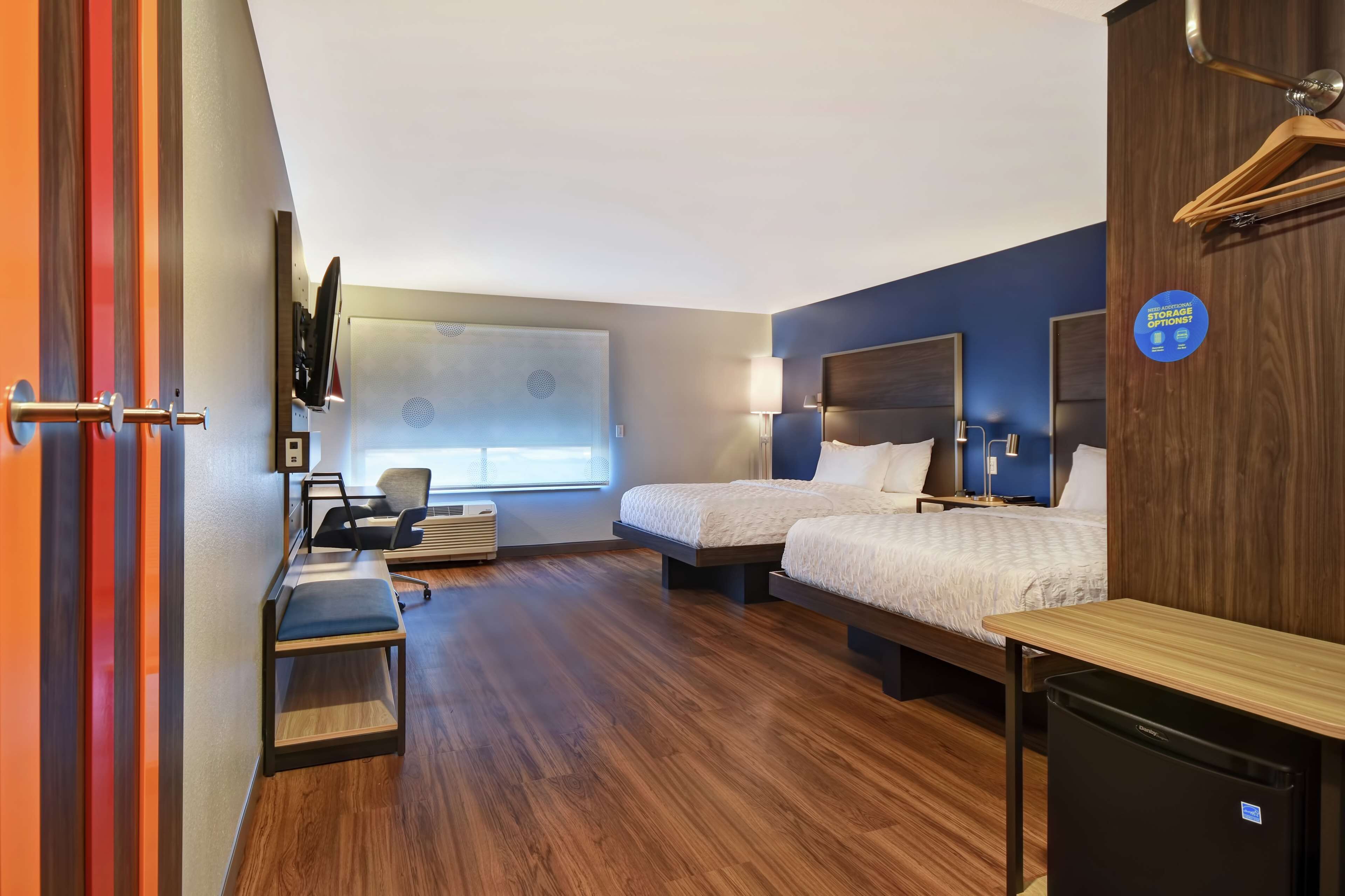 desk, laptop workspace, blackout curtains, iron/ironing board